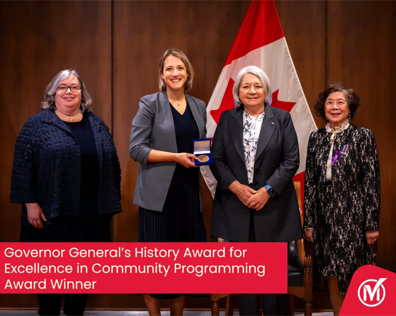 receiving the award are Janet Reid (Curator, Markham Museum), Rebekah Mitchell (Curator, YRDSB Museum & Archives), Her Excellency the Right Honourable Mary Simon (Governor General of Canada), and Nancy Siew (Founder, Tribute to Early Chinese Immigrants) at the official award ceremony in Winnipeg, Manitoba in November.