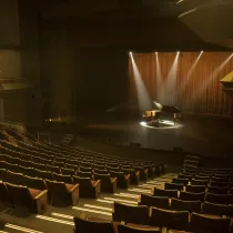 Stag of Flato Markham Theatre with a piano on stage.